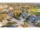 Aerial view showing the house's location in a residential community near a golf course at 3401 Avenida Madera # B, Bradenton, FL 34210