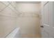Walk-in closet with white wire shelving and base drawers for organization at 3401 Avenida Madera # B, Bradenton, FL 34210