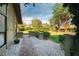 Brick pathway leads to the home's entrance, surrounded by well-maintained landscaping at 3401 Avenida Madera # B, Bradenton, FL 34210
