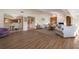 Spacious living room with hardwood floors and ample natural light at 3401 Avenida Madera # B, Bradenton, FL 34210