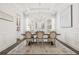 Elegant dining room with chandelier and seating for six at 4101 W Mullen Ave, Tampa, FL 33609