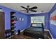 Spacious bedroom with a double bed and blue walls at 4124 W Watrous Ave, Tampa, FL 33629