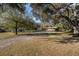 House nestled on a spacious lot with lush green surroundings at 4609 Horton Rd, Plant City, FL 33567