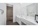 Clean bathroom with double vanity and updated fixtures at 4609 Horton Rd, Plant City, FL 33567