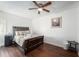 Serene bedroom with wood floors and a ceiling fan at 4609 Horton Rd, Plant City, FL 33567