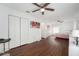 Spacious bedroom with hardwood floors and a walk-in closet at 4609 Horton Rd, Plant City, FL 33567