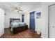 Spacious bedroom with wood flooring and a ceiling fan at 4609 Horton Rd, Plant City, FL 33567