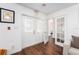 Bright and airy entryway with double doors and hardwood floors at 4609 Horton Rd, Plant City, FL 33567