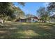Brick home with large backyard and mature trees at 4609 Horton Rd, Plant City, FL 33567