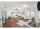 Bright living room with hardwood floors and comfortable seating at 4609 Horton Rd, Plant City, FL 33567