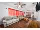Spacious living room with hardwood floors and ample natural light at 4609 Horton Rd, Plant City, FL 33567