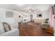 Spacious living room with hardwood floors, neutral colors, and ample natural light at 4609 Horton Rd, Plant City, FL 33567