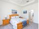 Spacious bedroom with wood furniture and en-suite bathroom access at 5733 Heronpark Pl, Lithia, FL 33547
