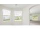 Dining area filled with natural light, complemented by views of the well-maintained yard at 5733 Heronpark Pl, Lithia, FL 33547
