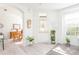 Welcoming entryway with light flooring and access to living and dining areas at 5733 Heronpark Pl, Lithia, FL 33547