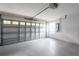 Clean, spacious two-car garage with automatic door at 5733 Heronpark Pl, Lithia, FL 33547