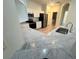 New kitchen with stainless appliances, granite countertops and white cabinetry at 5733 Heronpark Pl, Lithia, FL 33547