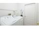 A spacious laundry room offers the ultimate in convenience at 5733 Heronpark Pl, Lithia, FL 33547