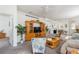 Open living space with a built-in entertainment center and comfortable seating at 5733 Heronpark Pl, Lithia, FL 33547