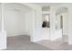 Open-concept living area that flows to kitchen with modern fixtures and plenty of light at 5733 Heronpark Pl, Lithia, FL 33547