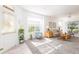Bright and airy living room with comfy seating and plenty of natural light at 5733 Heronpark Pl, Lithia, FL 33547
