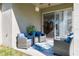 Relaxing patio with wicker furniture and a view of the backyard at 5733 Heronpark Pl, Lithia, FL 33547