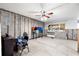 Unfinished living room with ceiling fan and window at 6490 Cape Hatteras Ne Way # 2, St Petersburg, FL 33702