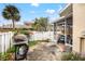 Private patio with grill and access to the backyard at 6490 Cape Hatteras Ne Way # 2, St Petersburg, FL 33702