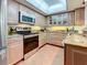 Well-equipped kitchen featuring stainless steel appliances at 700 Starkey Rd # 622, Largo, FL 33771