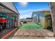 Backyard view showing a shed, and grassy area at 7505 Eastmoor Ct, Tampa, FL 33615