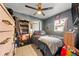 Bright bedroom featuring a double bed and ample closet space at 7505 Eastmoor Ct, Tampa, FL 33615