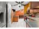 View of kitchen with stainless steel appliances and wood cabinets at 7505 Eastmoor Ct, Tampa, FL 33615