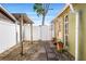 Private side yard with gated access and landscaping at 7505 Eastmoor Ct, Tampa, FL 33615