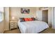 Bright bedroom with a queen-size bed and ample closet space at 880 Mandalay Ave # C710, Clearwater Beach, FL 33767