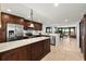 Modern kitchen with stainless steel appliances and island at 9415 Blind Pass Rd # 601, St Pete Beach, FL 33706