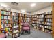 Community library with numerous bookshelves and comfortable seating at 9415 Blind Pass Rd # 601, St Pete Beach, FL 33706