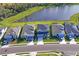 Aerial view of houses near a lake at 10507 Daybreak Gln, Parrish, FL 34219