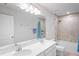 Double vanity bathroom with a shower/tub combo at 10507 Daybreak Gln, Parrish, FL 34219
