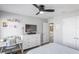 Bedroom with a desk, dresser, and view of the bathroom at 10507 Daybreak Gln, Parrish, FL 34219