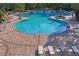 Large freeform community pool with plenty of deck space at 10507 Daybreak Gln, Parrish, FL 34219