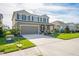 Two-story home with a two-car garage and landscaped yard at 10507 Daybreak Gln, Parrish, FL 34219