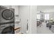Stackable washer and dryer in a convenient laundry room at 10507 Daybreak Gln, Parrish, FL 34219
