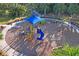 playground with playset, swings, and shade structure at 10507 Daybreak Gln, Parrish, FL 34219