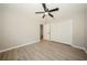 Bright bedroom with wood-look floors and spacious closet at 15909 Amberly Dr, Tampa, FL 33647