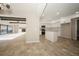Open concept kitchen with island and view into living room at 15909 Amberly Dr, Tampa, FL 33647