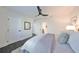 Bright bedroom with dark hardwood floors and ceiling fan at 1846 3Rd S St, St Petersburg, FL 33705
