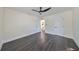 Simple bedroom with dark hardwood floors and ceiling fan at 1846 3Rd S St, St Petersburg, FL 33705