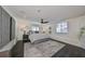 Large bedroom with dark hardwood floors, ceiling fan and rug at 1846 3Rd S St, St Petersburg, FL 33705