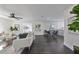 Open concept dining room with dark hardwood floors and seating for four at 1846 3Rd S St, St Petersburg, FL 33705