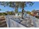 Light blue house exterior with a large backyard patio and white fence at 1846 3Rd S St, St Petersburg, FL 33705